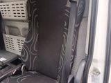 an image of a car seat with a laptop on it