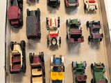 a box full of toy cars on a table