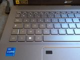 a laptop computer sitting on top of a table