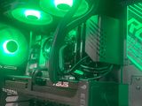 three green lights on the side of a computer case