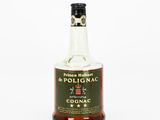 a close up of a bottle of liquor on a white surface