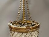 an image of a chandelier hanging from a ceiling in a room