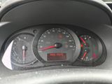 a close up of a car dashboard with a speedometer
