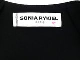the label on the back of a black t - shirt