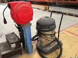 a machine that is sitting on the floor in a warehouse