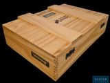 two wooden boxes stacked on top of each other on a black background