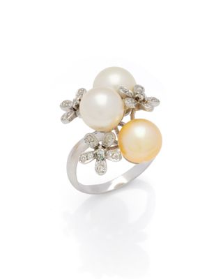 a white and yellow pearl and diamond ring