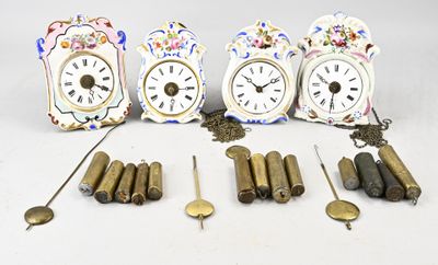 many different clocks and pendulums that are on the table