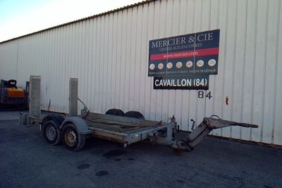 an image of a trailer parked in front of a building