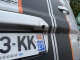 a close up of a number plate on a car