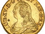 une pièce d'or sur laquelle est représenté le profil d'une femme