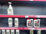many bottles of cleaning products on the shelves in the store