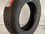 a close up of a tire on a white surface