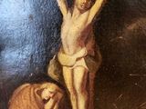 an image of a painting of jesus on the cross with a woman kneeling beside him