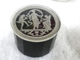 a silver and black box with a picture on it