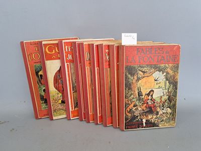 five children ' s books are lined up on a gray surface