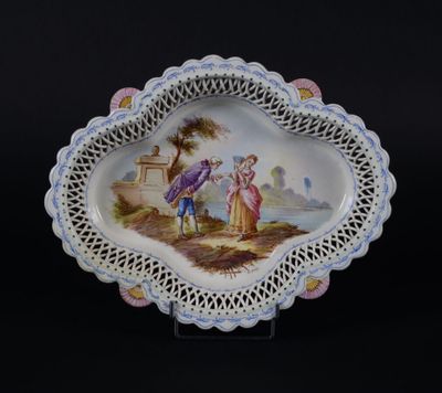 une image représentant une assiette sur laquelle figure le portrait d'un couple