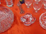 a lot of glass items that are on the table