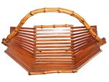 wooden basket with bamboo handles and handles on a white background