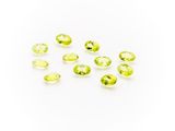 a group of yellow sapphires on a white background