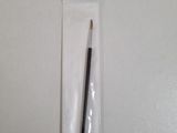 a pencil in a plastic bag with a black handle