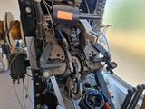 a machine that is sitting in a room with a lot of wires on it
