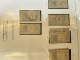 a sheet of paper with stamps on it on a table