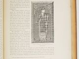 an open book with a picture of a man on it