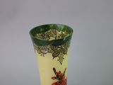 two vases that have been painted with flowers on them