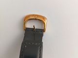 an image of a close up of a watch on a white surface