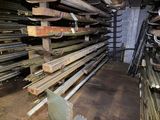 a lot of wooden beams stacked on top of each other