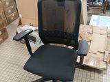 a black office chair with a black seat and back rest