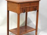 an image of a small wooden table with a drawer on top of it