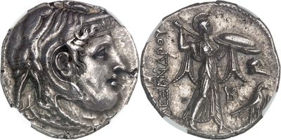 a silver coin with an image of a woman on it
