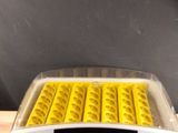 an image of a digital egg incubator on a table