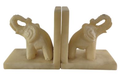 pair of elephant bookends on marble base on white background