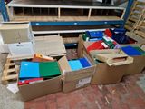 many boxes that are sitting on the floor next to each other