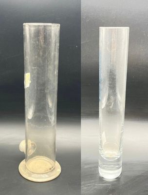 two different views of a glass vase with a coin in it