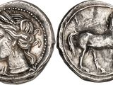 une pièce d'argent sur laquelle figurent une femme et un cheval