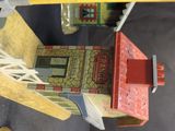 a toy house that is sitting on a table