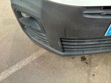 a close up of the front bumper of a car