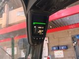 a view of the inside of a bus from the driver ' s seat