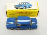 a small blue toy car in front of a box
