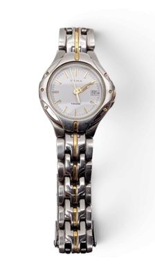 an image of a close up of a wrist watch on a white surface
