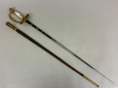 two swords with gold and black handles on a white surface