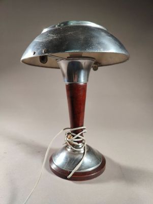 a lamp that is on a table with a cord