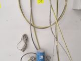 a wall with a bunch of wires attached to it