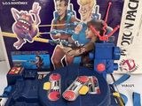 an image of a toy tank with a toy figure on top of it