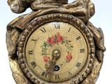 a clock that is sitting on top of a table