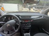 a picture of a car with a steering wheel and dashboard